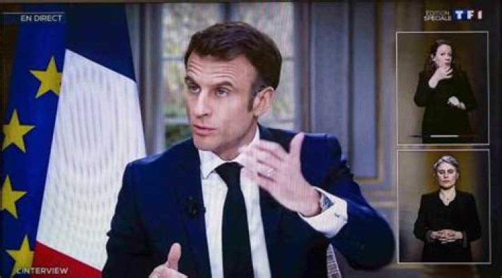 Why did Emmanuel Macron remove his luxury watch mid-TV appearance?
